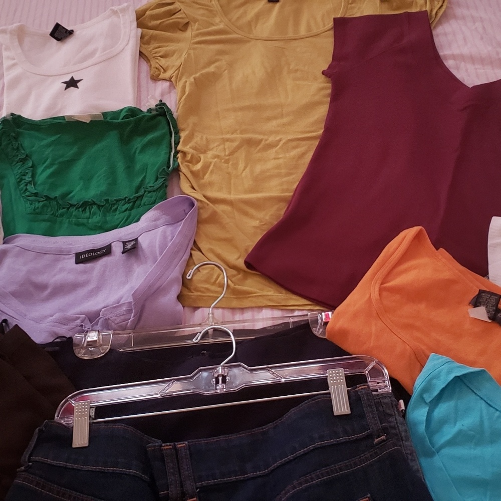 At least 7 short sleeve knit tops, two skirts... o